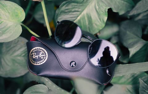 Lunettes de soleil Ray-Ban, comme neuf