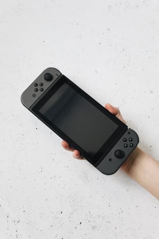 Nintendo Switch standard + 2 jeux