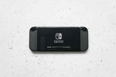 Nintendo Switch OLED + 3 jeux